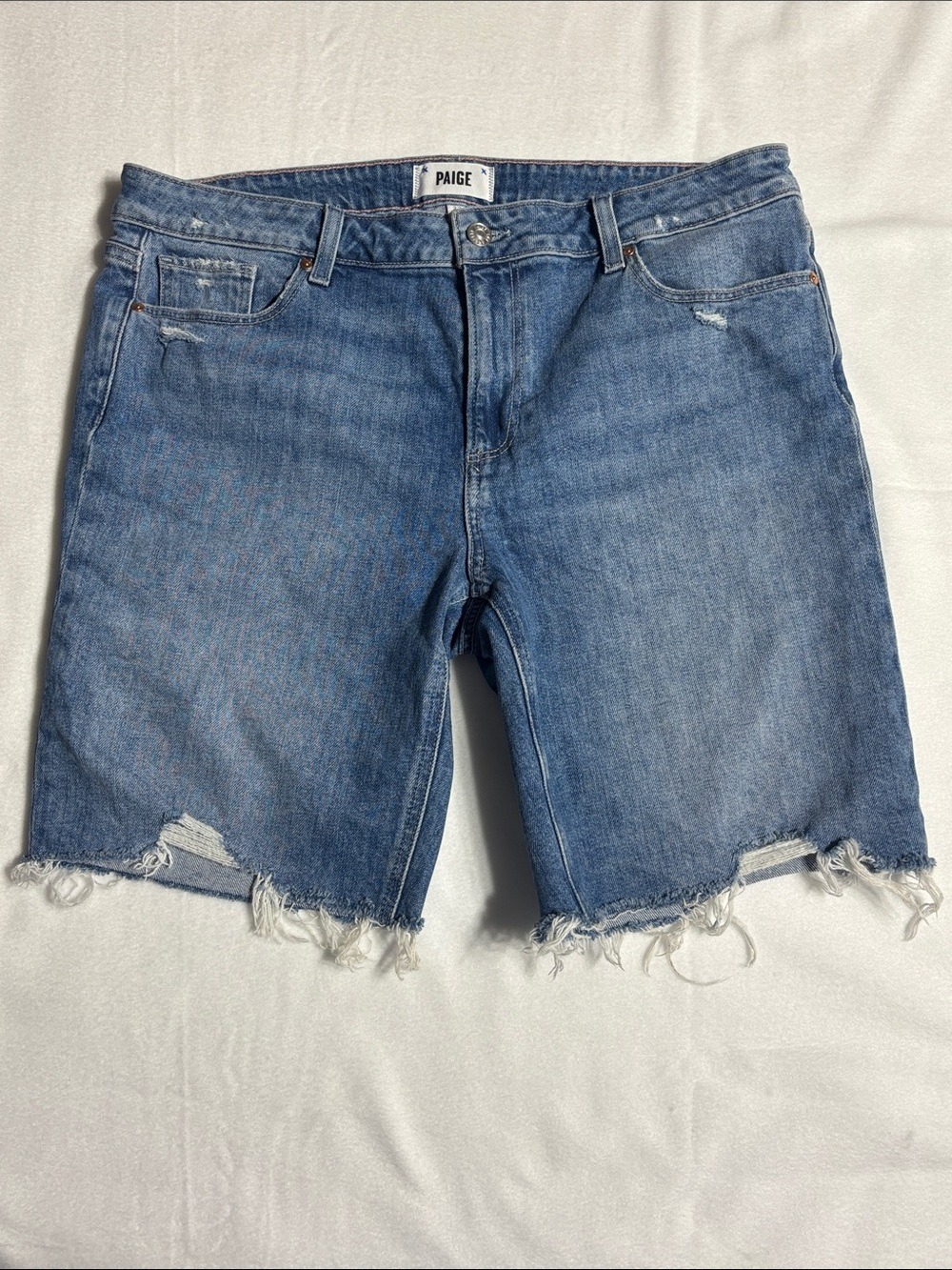 PAIGE Wanda Jax Knee Distressed Denim Cutoff Shorts